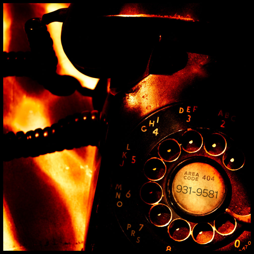 Rotary telephone with Kevin Ames Photography's number: (404) 9319581